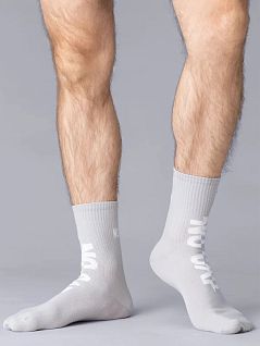 Носки скомфортной широкой резинкой "в рубчик" и яркими сленговыми надписями на фронтальной и задней части Omsa JSFREE STYLE 600 (5 пар) grigio chiaro/lurex oms
