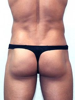 Соблазнительные мужские трусы стринги чёрного цвета Romeo Rossi Mini thong R1005-2