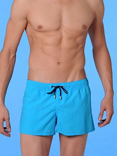 Короткие шорты накладным карманом голубого цвета HOM 07857cG5