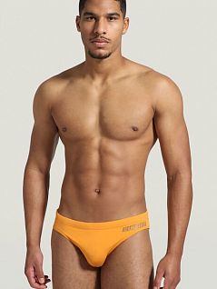 Однотонные плавки брифы из полиамида оранжевого цвета Bikkembergs BKK1MSP01cOrange